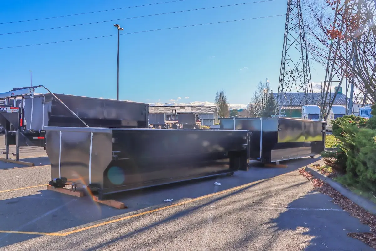 Roll-off dumpster ready for waste disposal at job site for 3 Yard Dumpster Rental in Vernon